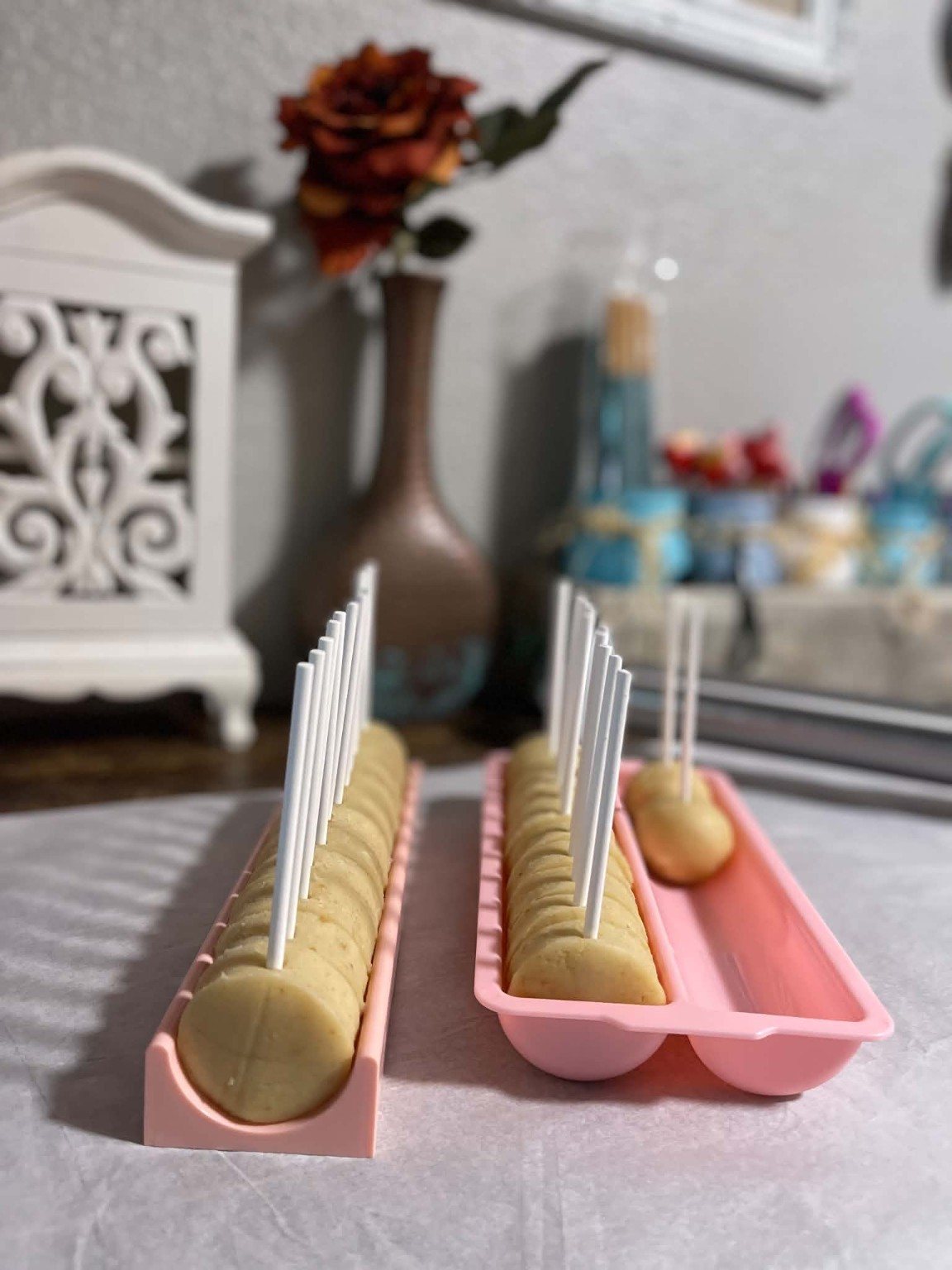 Behind the scenes: cake pop rounds lined up and ready for sticks